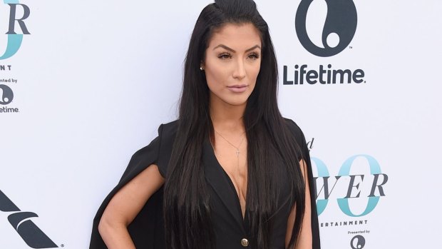 Natalie Eva Marie has slammed Qantas on social media after being refused entry to the business lounge at Melbourne Airport.
