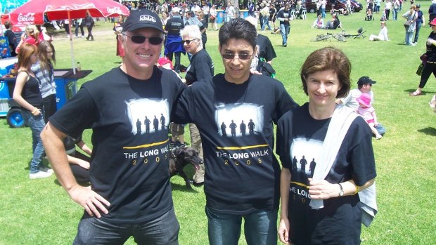 'He introduced me to the Australian way of life': Michael Gordon, Ali Mullaie and Michael Gordon's wife Robyn Carter at the Long Walk 2005.
