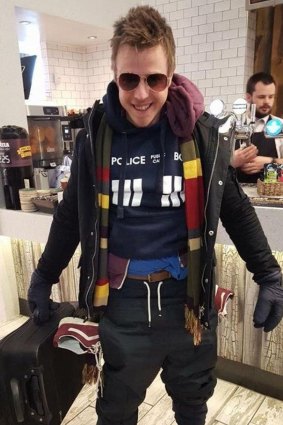 Matt Botten at Gatwick Airport wearing layer upon layer of clothing from his second bag.