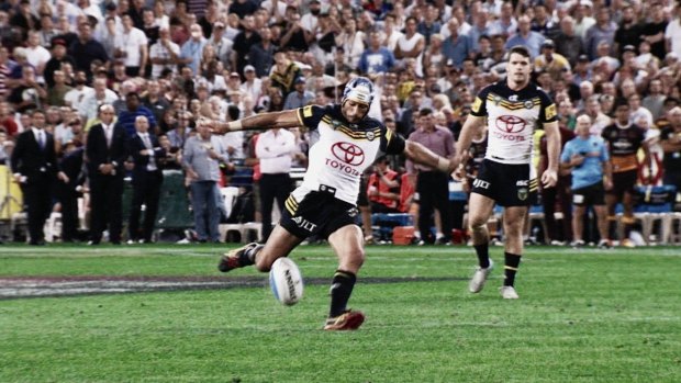 The moment: Johnathan Thurston kicks the field goal to win the 2015 grand final.