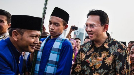 Ahok, right, in 2014. A Christian and ethnic Chinese, he became governor after his predecessor and political ally Joko Widodo was elected president of Indonesia.