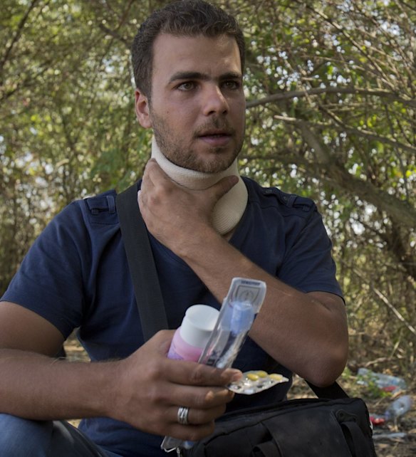 Mekdad Marey has to wear a neck brace due to chronic back pain.