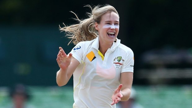 Jubilant: Ellyse Perry strikes with the red ball during the Women's Ashes in England.