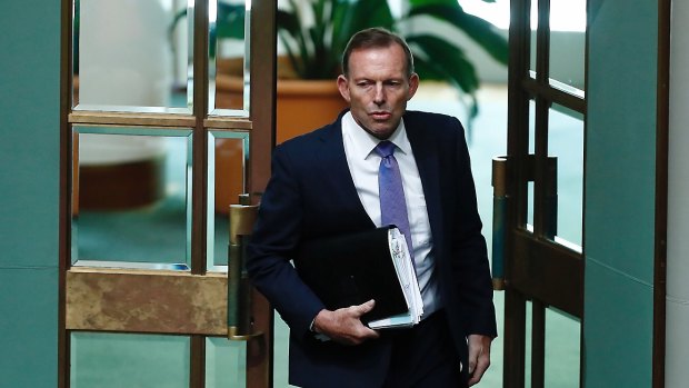 Former prime minister Tony Abbott arrives for  question time on Monday.
