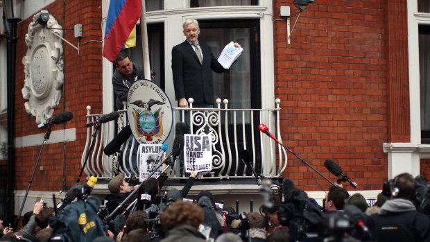 Julian Assange on the balcony of the Ecuadorian embassy in London last year.