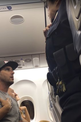 Footage from video taken on the plane shows Brian Schear remonstrating with staff. 