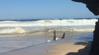 Large swell rolls towards the artwork 'Fair Dinkum Offshore Processing', which was destroyed.
