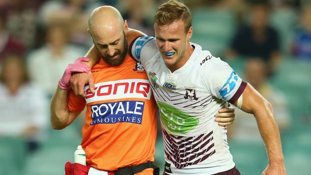 Injury worry: Daly Cherry-Evans limps off the Allianz Stadium turf.