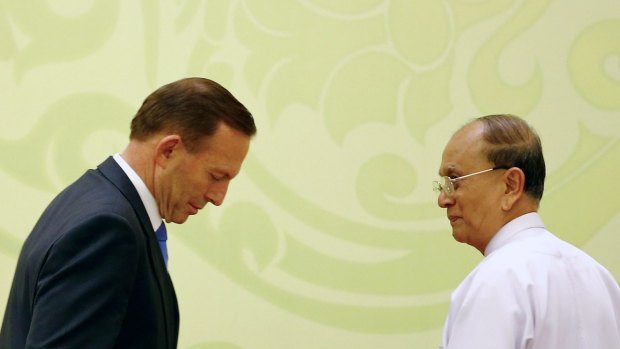 Australian PM Tony Abbott bows to Myanmar President Thein Sein.