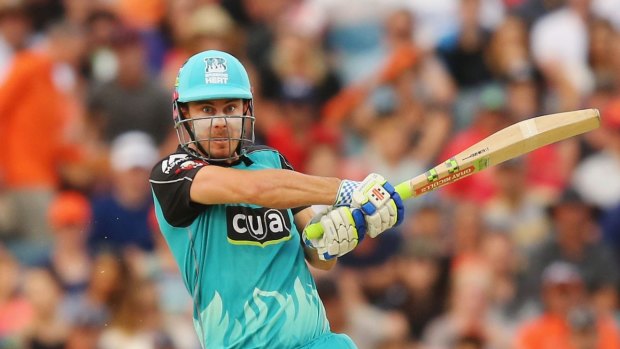 Missing you already: Chris Lynn hits lustily for the Heat.