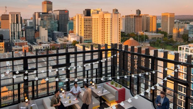 Hotel Indigo's Merrymaker Rooftop Bar, within striding distance of Adelaide Central Market. 