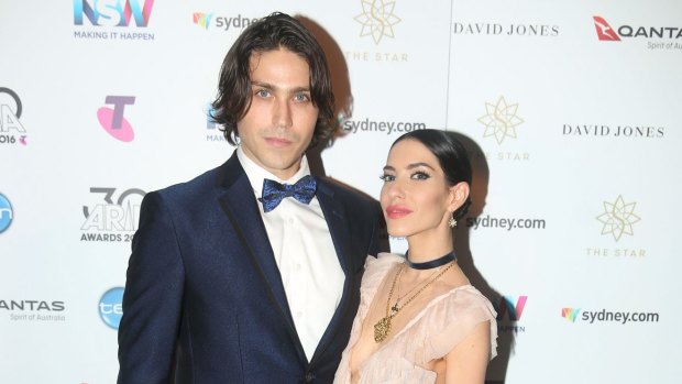 Lisa Origliasso and Logan Huffman pose in awards room during the 30th Annual ARIA Awards 2016 at The Star on November 23, 2016 in Sydney, Australia. 