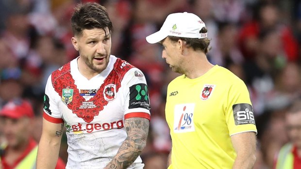 Turning point: Gareth Widdop leaves the field in the first half. 