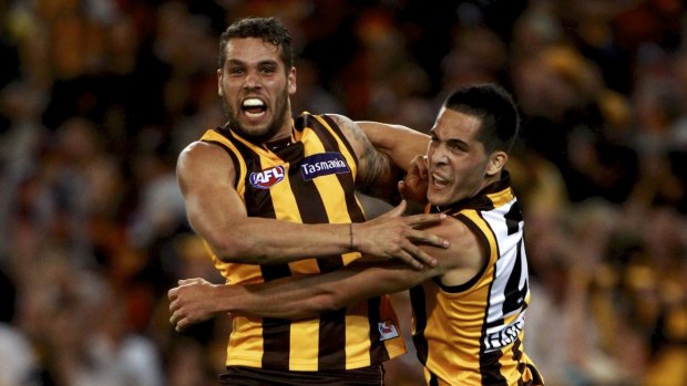 Old times: Shane Savage celebrates a goal with Lance Franklin in 2012.