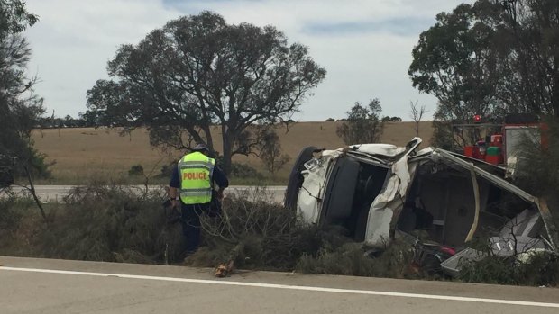 It's understood the van rolled after clipping the truck.