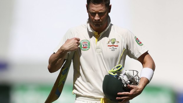 Rought trot: Michael Clarke trudges off after being dismissed in the first innings.