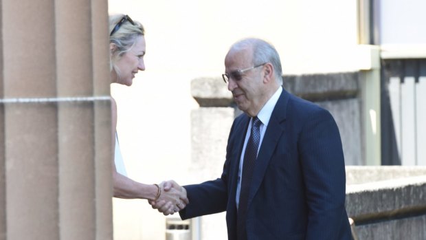Margaret Cunneen shaking hands with Eddie Obeid outside the NSW Supreme Court in Darlinghurst in February.