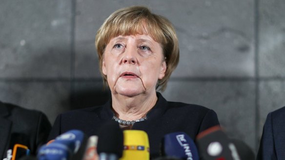 German Chancellor Angela Merkel, delivers a statement on Thursday to media.