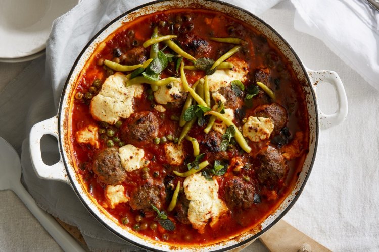 Karen Martini's baked Lebanese lamb meatballs with peas and labna.