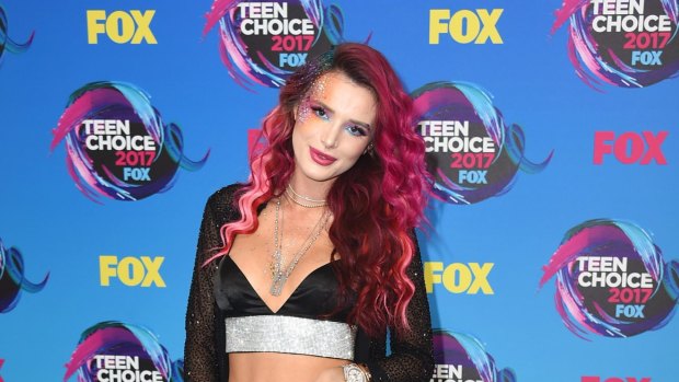Bella Thorne arrives at the Teen Choice Awards at the Galen Center on Sunday, Aug. 13, 2017, in Los Angeles. 