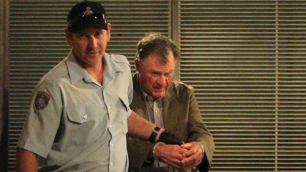 Ian Turnbull is led away from court during his trial for murder. He died in custody.