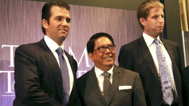 Donald Trump jnr, left, and Eric Trump with Philippine real estate developer Jose E.B. Antonio at the announcement of the Trump Tower Manila in 2012.