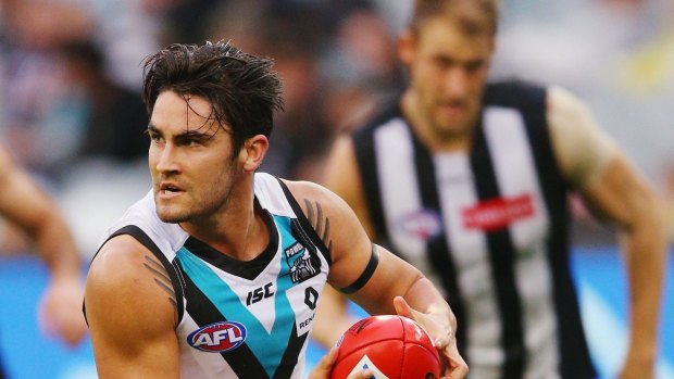 Chad Wingard finds some space for Power.
