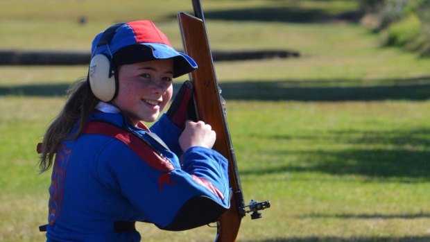 New England Girls' School team member Ella (from Moree) finishing her target rifle shooting stage at Hornsby Range.