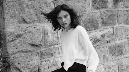 Sportmax sweater, $1195. Rebecca Vallance  “Ryder” pants, $399. Bottega Veneta sandals, $1190.