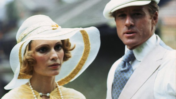 Robert Redford as Jay Gatsby and Mia Farrow as Daisy in the 1974 film of <i>The Great Gatsby</i>. 