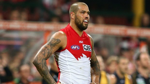 Bad night:  Lance Franklin of the Swans looks on from the sideline.