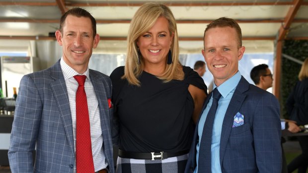 Jockeys Hugh Bowman (left) and Kerrin McEvoy with Sam Armytage at the launch of the $320,000 The Everest trophy. 