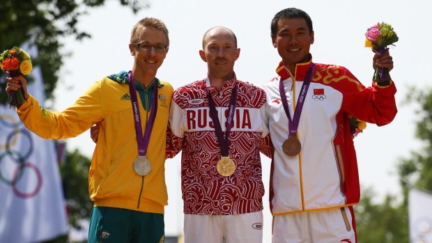 Silver medallist Jared Tallent with gold medalist Sergey Kirdyapkin of Russia and bronze medalist Tianfeng Si of China in London in 2012.