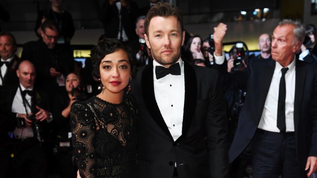 Actress Ruth Negga and actor Joel Edgerton leave the "Loving" premiere during the 69th annual Cannes Film Festival at the Palais des Festivals.