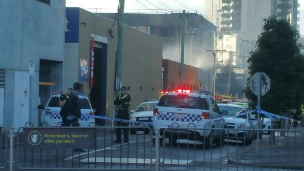A man has been hospitalised after a fire at a mechanic in Southbank.