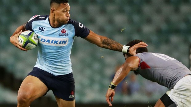 Running man: Israel Folau takes on the Kings.