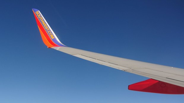 A wing with winglet on a Southwest Airlines Boeing 737-700 jet.