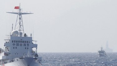 Chinese Coast Guard ships in disputed waters in the South China Sea last year.