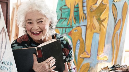 Mirka Mora in her studio wearing a Gorman dress featuring her work Naked Angel.
