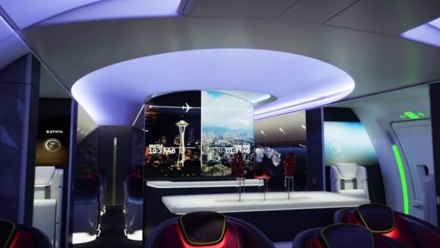 The future of Boeing plane cabins will feature video screens on the ceiling and bulkheads. 