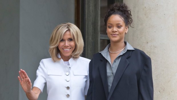 With singer Rihanna on the steps of the Élysée Palace. 