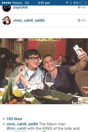 Famous friends: Cahill with Jackie Chan.