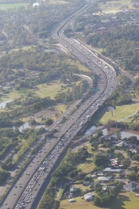 Traffic on the Pacific Motorway is crawling for about 12 kilometres.