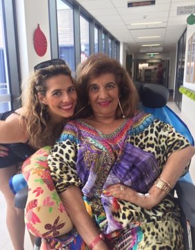 Maria Venuti (R) with her daughter Bianca Venuti-Hughes leaving the facility on New Year's Day.
