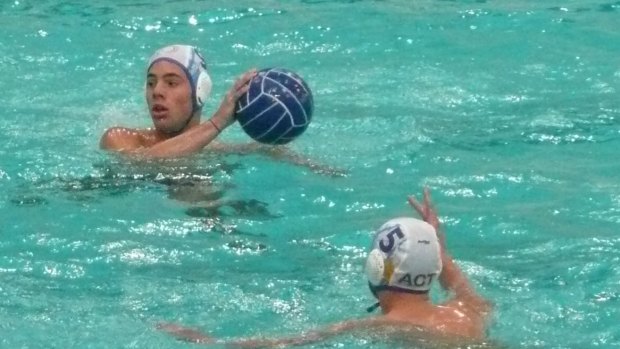 Gus Shepherd in action for the ACT water polo team.
