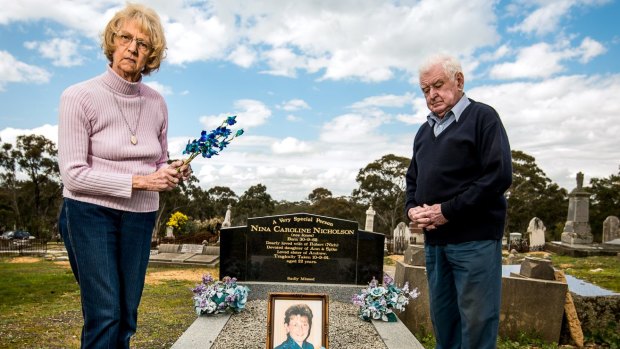 Ann and Spike Jones at Nina's grave. Nina was 22 years old when she was murdered on her front porch in Clunes in 1991.