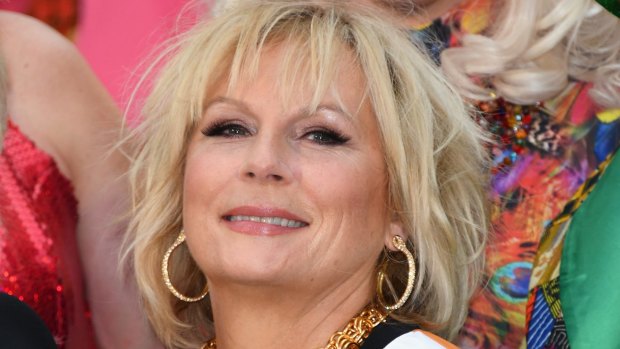 Jennifer Saunders says her real world of family and grandchildren could not be more different to that of her screen character Edina.