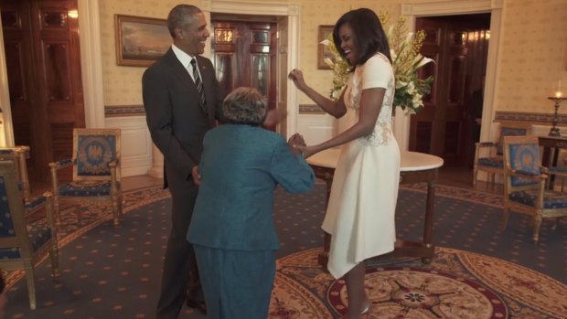 106-year-old Virginia McLaurin dances with joy as she meets Barack and Michelle Obama.
