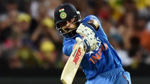 Brilliant form ... Virat Kohli of India lashes out on his way to 90 off 50 balls during the Twenty20 International at Adelaide Oval.