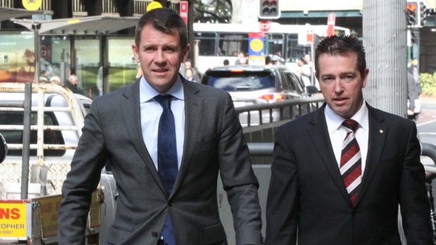 Spoiling for a fight: Premier Mike Baird and Local Government Minister Paul Toole.